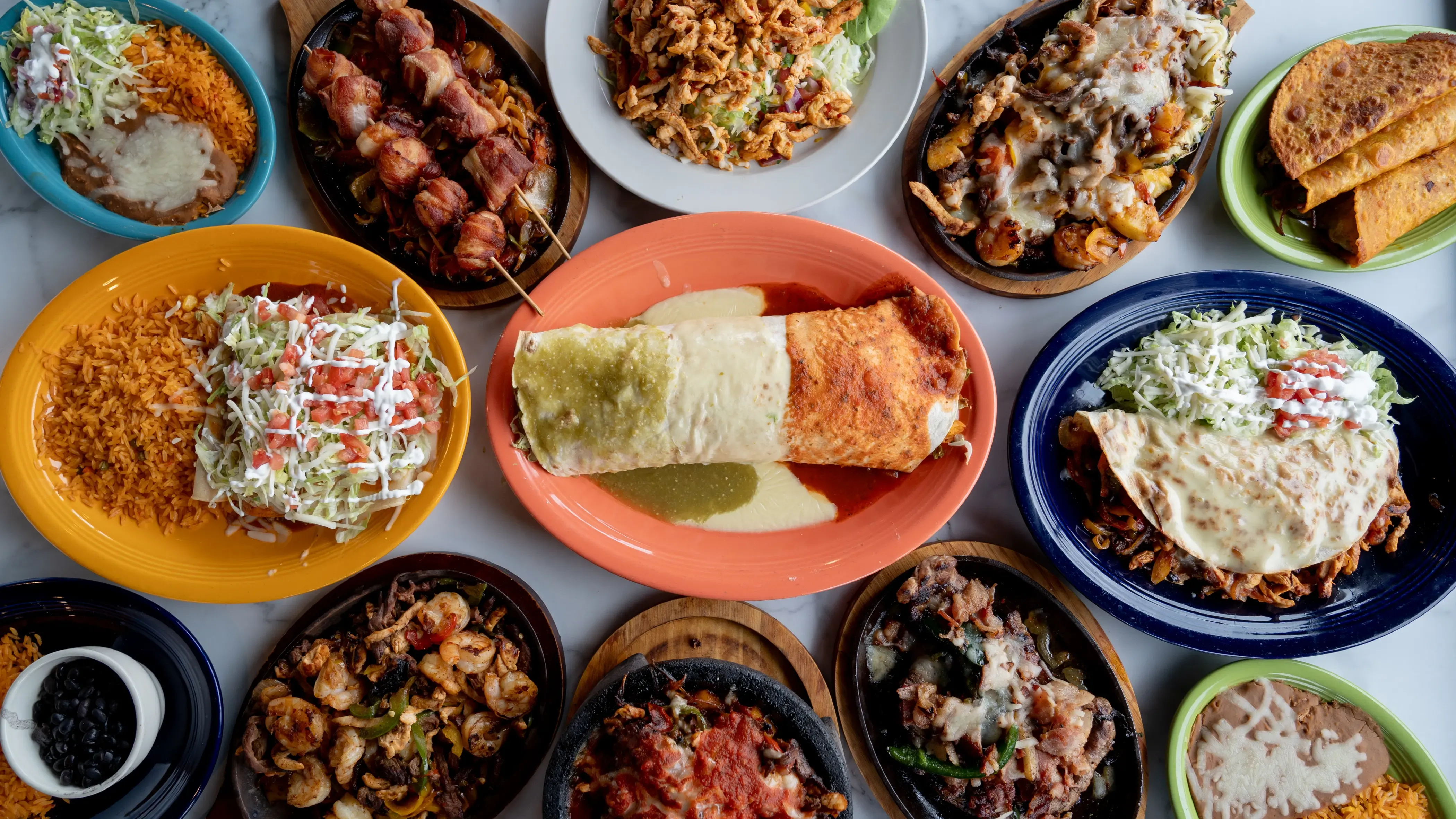 El Dorado Mexican Restaurant's most popular dishes beautifully presented on a table in Plattsburgh, NY
